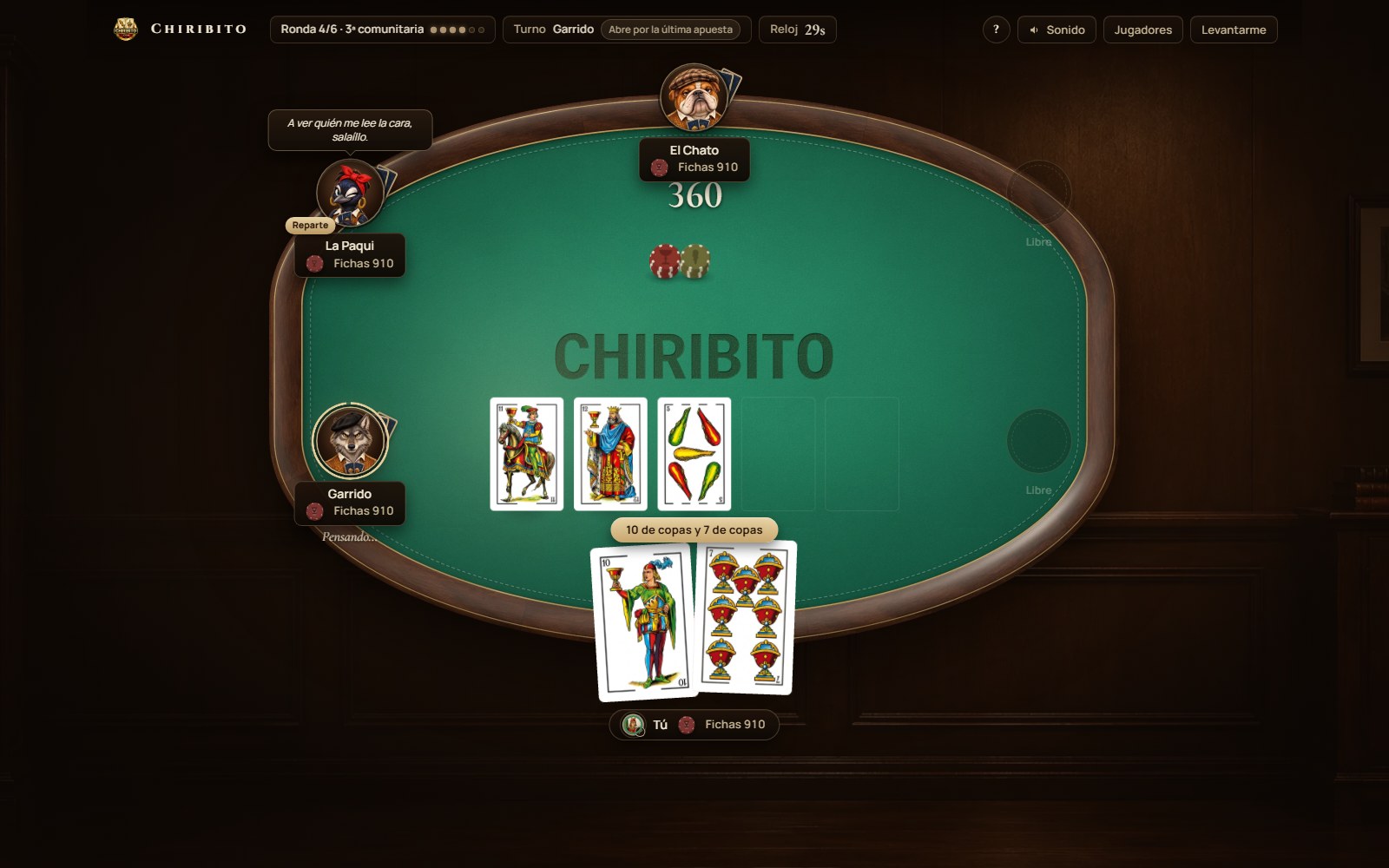 Una mesa de Chiribito en el ordenador, con tres cartas comunes sobre el tapete